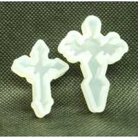 mal kruisje groot 4,5 x 3 cm.